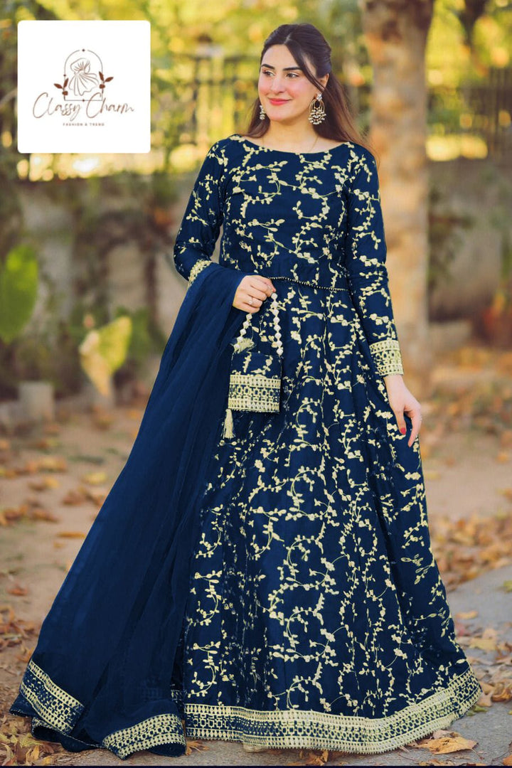 4 PIECE EMBROIDERED TOP WITH LONG FLARE EMBROIDERY SKIRT AND FOUR SIDE BORDER EMBROIDERED DUPATTA WITH EIDI POTLI